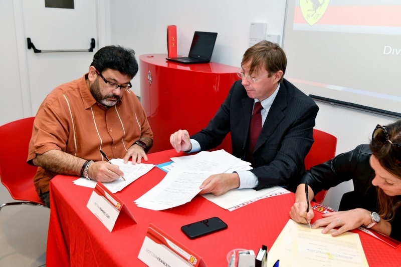 Javier Beltran signing the SFC Agreement