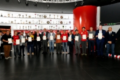 Photo Group of the new 14 Clubes at the Museo Ferrari Trophy Room